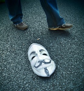 La maschera di "V di Vendetta" in terra a Roma il 15 ottobre